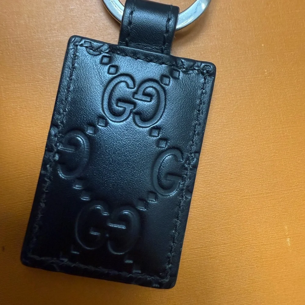 Brand new with box and dustbag Gucci Black Embossed Leather Key Holder keychain